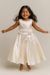 Ivory Satin Full-Length Party Gown with Oversized Floral Bow & Pastel Embroidery – Elegant Sleeveless Dress for Girls Age 3 to 10 Years – Birthday, Wedding & Festive Wear